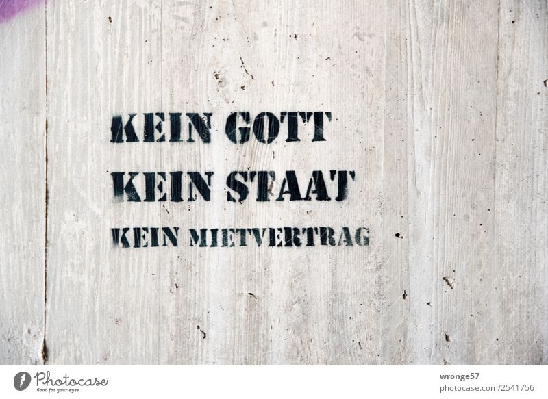 No rental agreement Concrete Characters Signs and labeling Graffiti Town Gray Black Concrete wall Landscape format God Politics and state Tenant Rent Keyword