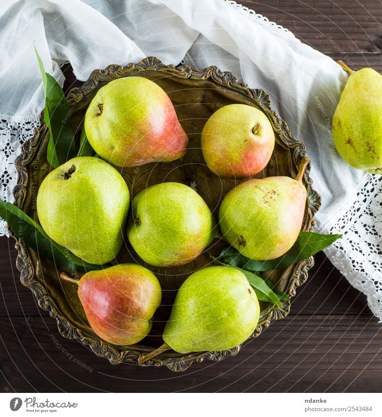 ripe green pears Fruit Nutrition Vegetarian diet Diet Plate Table Nature Leaf Wood Eating Fresh Natural Juicy Yellow Green Pear background Rustic food healthy
