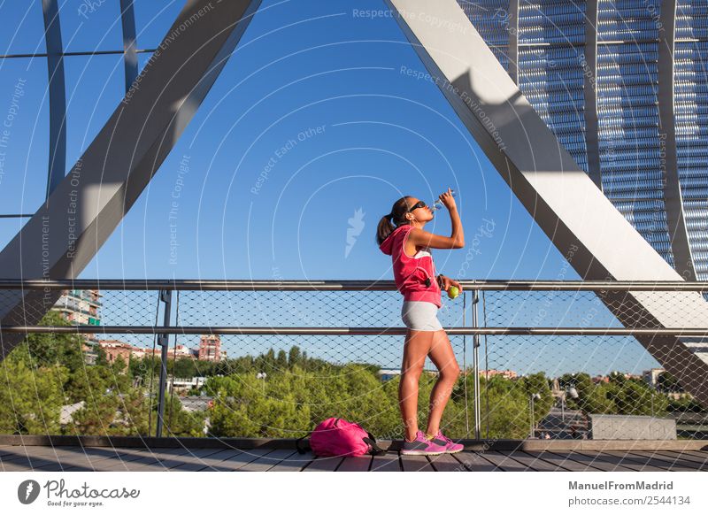 young woman runner having a rest outdoors Drinking Lifestyle Happy Beautiful Body Wellness Summer Sports Jogging Human being Woman Adults Fitness Runner running