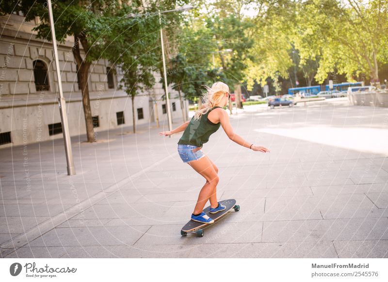 young woman skating Lifestyle Style Joy Beautiful Leisure and hobbies Summer Woman Adults Downtown Street Blonde Cool (slang) Eroticism Hip & trendy casual