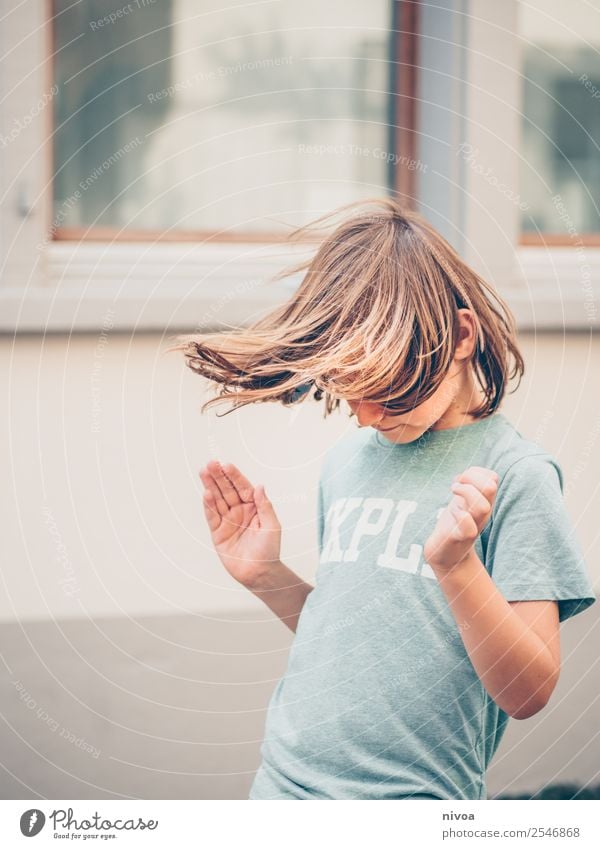 long-haired boy makes hula hoop Leisure and hobbies Hula hoop Sports Fitness Sports Training Parenting Child Schoolchild Human being Masculine Boy (child) 1