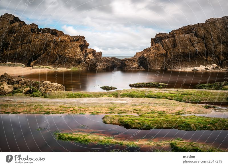 breakwater Nature Landscape Plant Air Water Sky Clouds Horizon Summer Beautiful weather Rock Coast Beach Bay Reef Ocean Deserted Maritime Wild Blue Brown Yellow