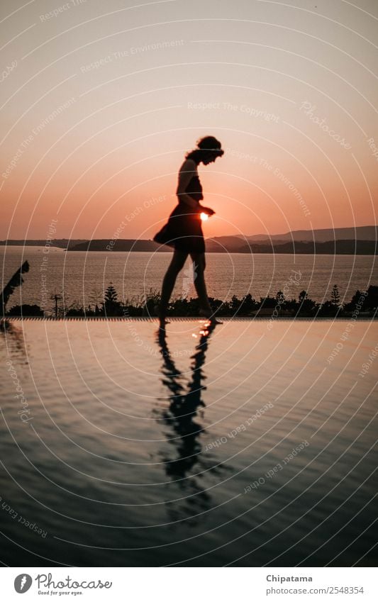 Happy Carefree Woman Enjoying Beautiful Sunset on the Pool Young woman Youth (Young adults) Success Fitness Nature Vacation & Travel sunset water reflection
