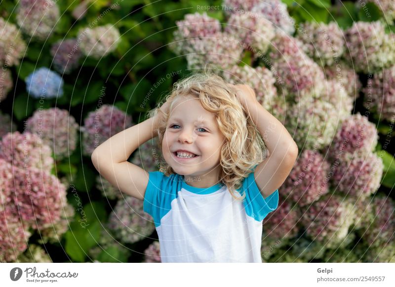 Cute small child with long hair in the garden Happy Beautiful Face Summer Garden Child Human being Baby Boy (child) Man Adults Infancy Hand Environment Nature