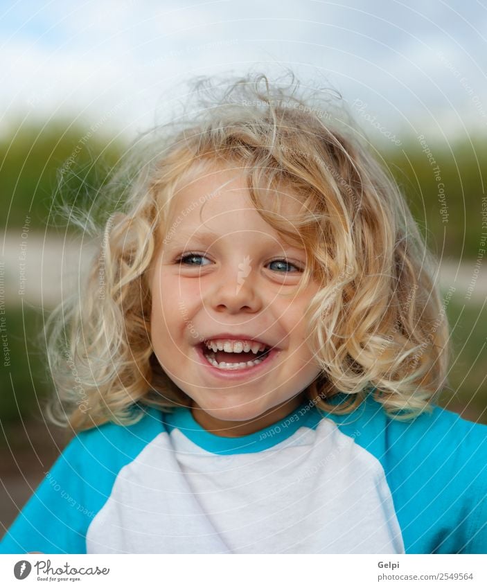 Small child with long blond hair enjoying Happy Beautiful Face Summer Child Human being Baby Boy (child) Man Adults Infancy Environment Nature Plant Blonde