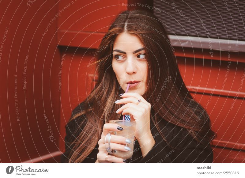 young woman drinking coffee in cafe Feminine Young woman Youth (Young adults) 18 - 30 years Adults Sit Coffee Café Walking City Autumn Black Style Drinking