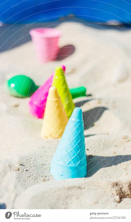 beach toy Lifestyle Family & Relations Infancy Youth (Young adults) Environment Sand Uniqueness Summer vacation Beach Swimming & Bathing Ice cream