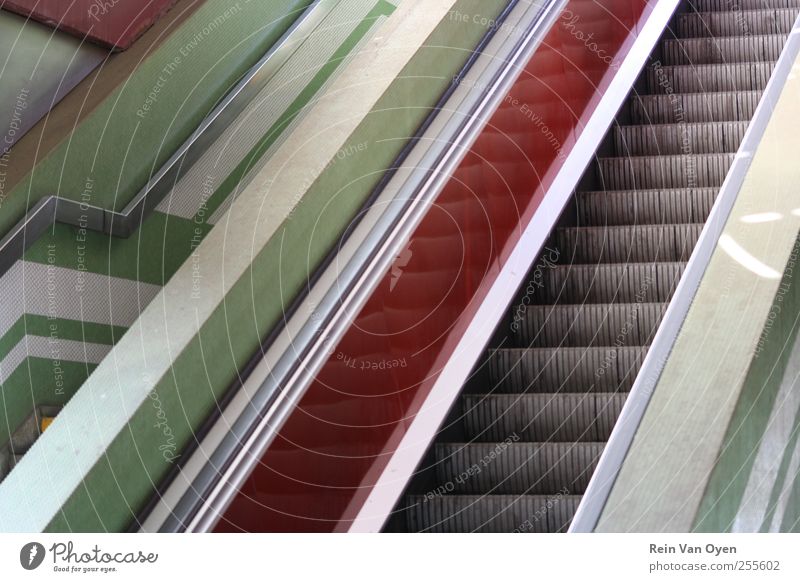 Escalator lines Train station Airport Stairs Staircase (Hallway) Escalate Line composition Green Red Reflection Repeating Handrail Compose Colour photo Abstract