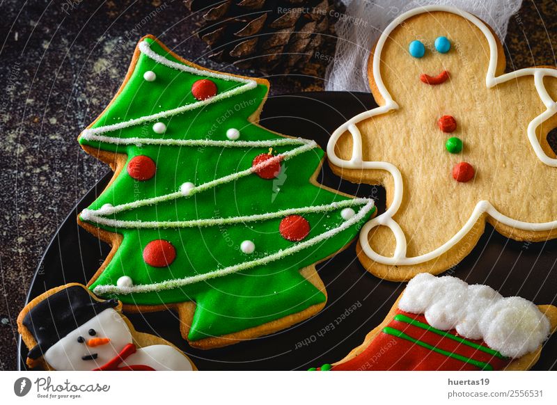 Christmas cookies on dark table. Dessert Vacation & Travel Decoration Feasts & Celebrations Family & Relations Tree Tradition Biscuit Food background Ornaments