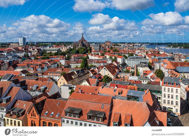 View of the Hanseatic city of Rostock Relaxation Vacation & Travel Tourism House (Residential Structure) Clouds Tree River Town Building Architecture Roof