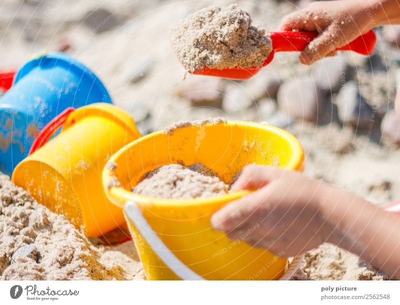 Child shovels sand on the beach Vacation & Travel Tourism Far-off places Freedom Summer Summer vacation Sunbathing Beach Ocean Island Toddler Girl Boy (child)