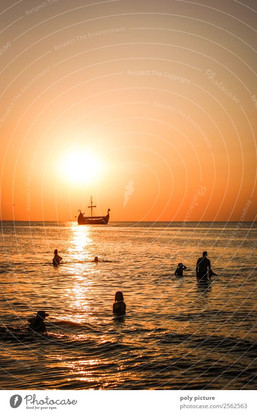 Viking ship passes bathers at sunset Vacation & Travel Tourism Trip Adventure Far-off places Summer Summer vacation Sun Sunbathing Beach Ocean Island Waves