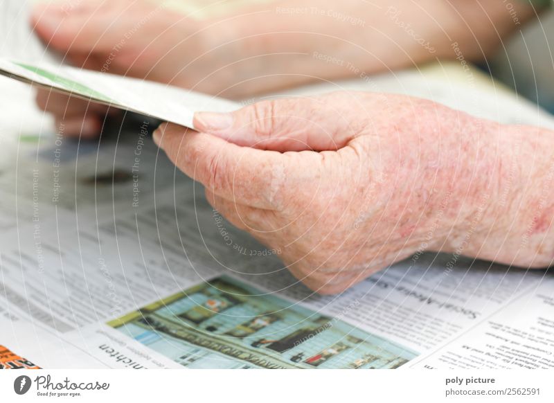 Senior hand holds newspaper Female senior Woman Male senior Man Grandparents Senior citizen Grandmother Hand 60 years and older Education Advancement Identity