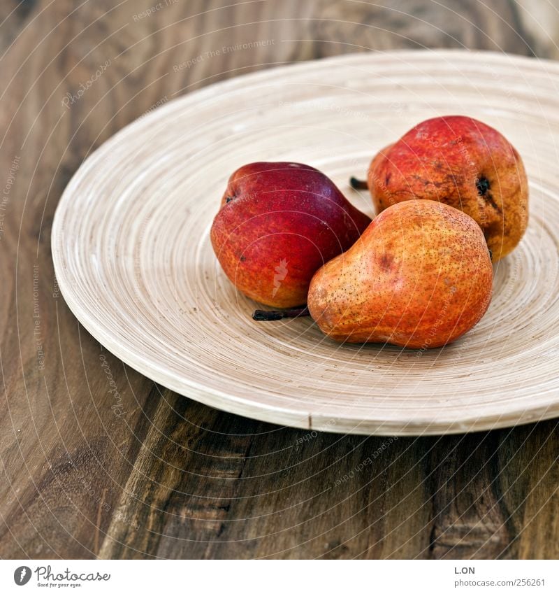 red pears Food Fruit Pear Nutrition Organic produce Vegetarian diet Bowl Table Kitchen Wood Delicious Juicy Sweet Red Colour photo Subdued colour Interior shot