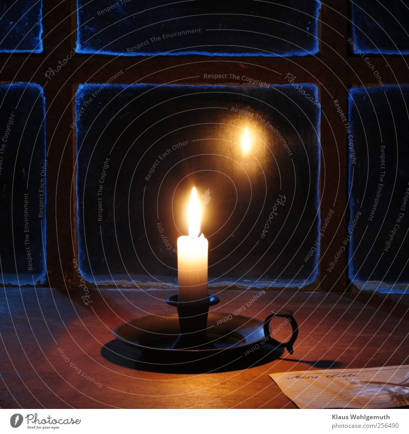 "My love," reads a note illuminated by a candle in front of a rusty transom window Christmas & Advent Funeral service Window Stationery Paper shoulder stand