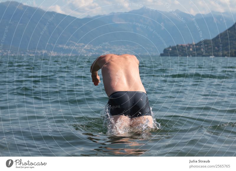 to dive down lake mountains Masculine Man Adults 1 Human being 30 - 45 years Water Drops of water Clouds Summer Mountain Waves Lake Lago Maggiore