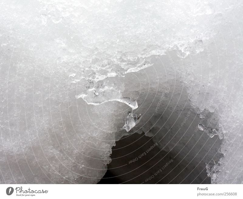 snow hole Winter Ice Frost Snow Water Freeze Cold White Bizarre Hollow spatial Colour photo Exterior shot Day