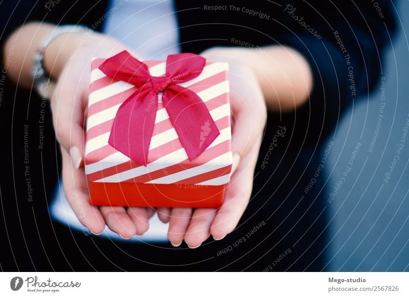 female hands holding a small gift box, present. Elegant Design Happy Beautiful Decoration Feasts & Celebrations Christmas & Advent Wedding Birthday Human being