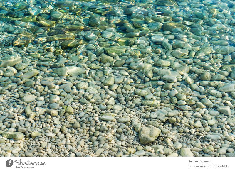 Pebbles in the sea Design Life Harmonious Senses Relaxation Calm Vacation & Travel Beach Ocean Waves Environment Nature Elements Water Summer Coast Lakeside