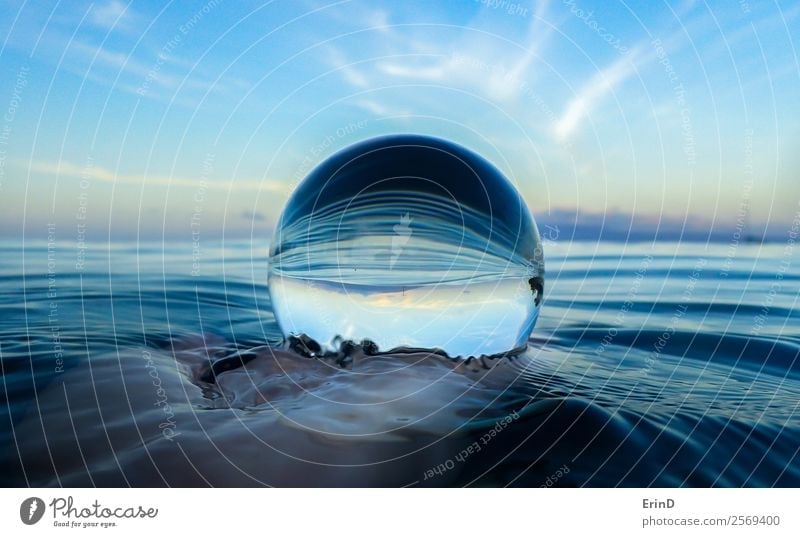 Ocean Surface Ripples Close up in Glass Ball Calm Vacation & Travel Waves Hand Environment Nature Landscape Sky Virgin forest Sphere Wet Blue Serene Peace water