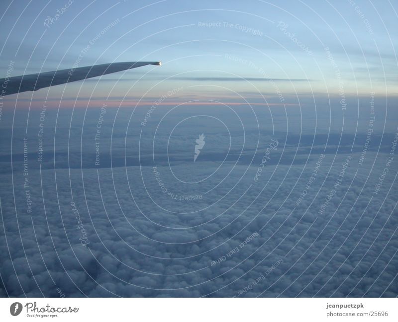 Flight to London Airplane Clouds Window Stern Wing Aviation Sky Sun Looking ryanair
