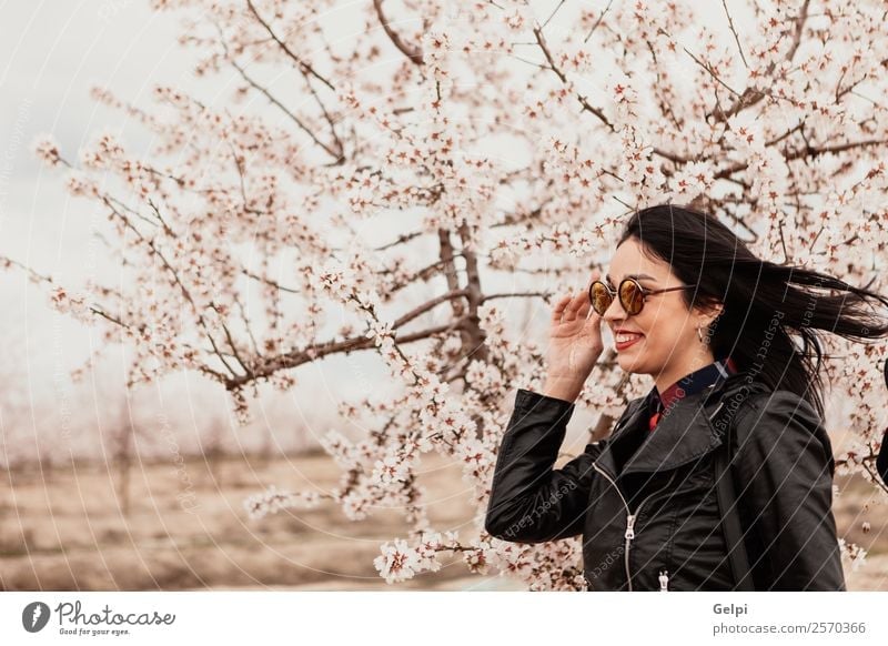 Girl Style Happy Beautiful Face Garden Human being Woman Adults Nature Tree Flower Blossom Park Fashion Jacket Leather Sunglasses Brunette Smiling Happiness