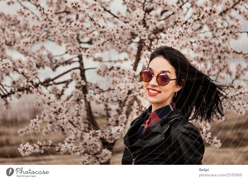 Girl Style Happy Beautiful Face Garden Human being Woman Adults Nature Tree Flower Blossom Park Fashion Jacket Leather Sunglasses Brunette Smiling Happiness