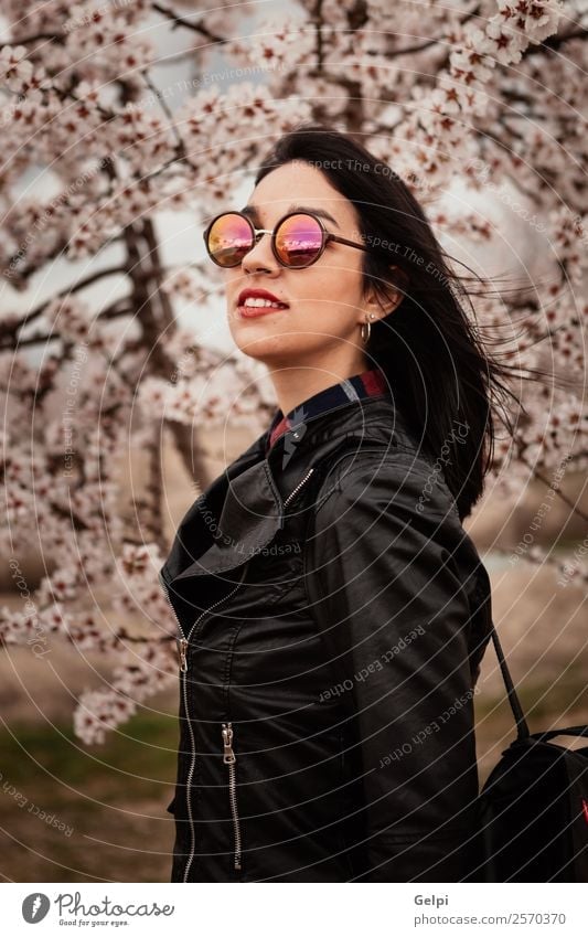 Girl Style Happy Beautiful Face Garden Human being Woman Adults Nature Tree Flower Blossom Park Fashion Jacket Leather Sunglasses Brunette Smiling Happiness