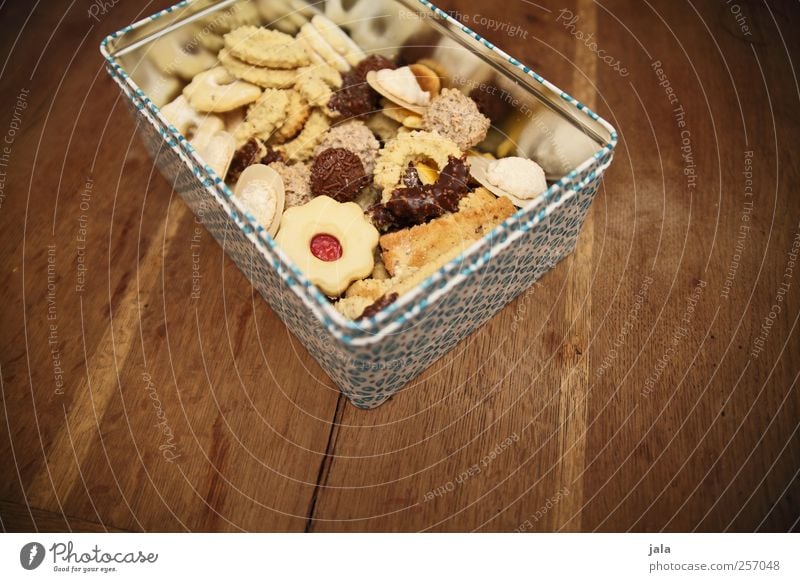 hip gold Food Dough Baked goods Candy Cookie Christmas biscuit Nutrition Finger food Tin Delicious Sweet Wooden table Colour photo Interior shot Deserted