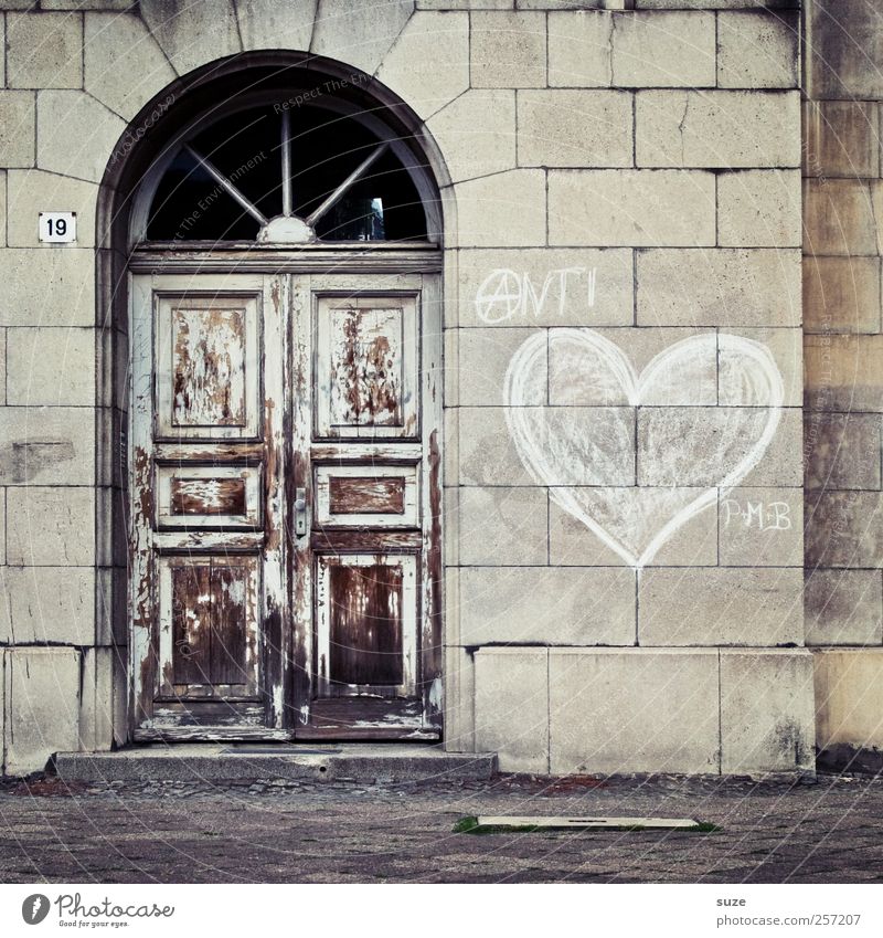 The last door Living or residing House (Residential Structure) Wall (barrier) Wall (building) Facade Door Graffiti Heart Old Authentic Brown Gray Mysterious