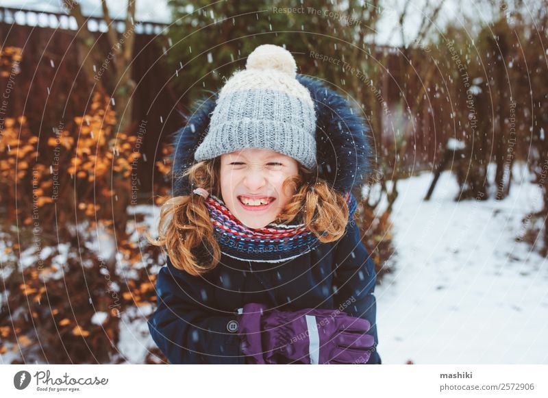 winter lifestyle portrait of happy kid girl playing Lifestyle Joy Playing Vacation & Travel Winter Snow Garden Child Nature Weather Warmth Park Clothing Gloves