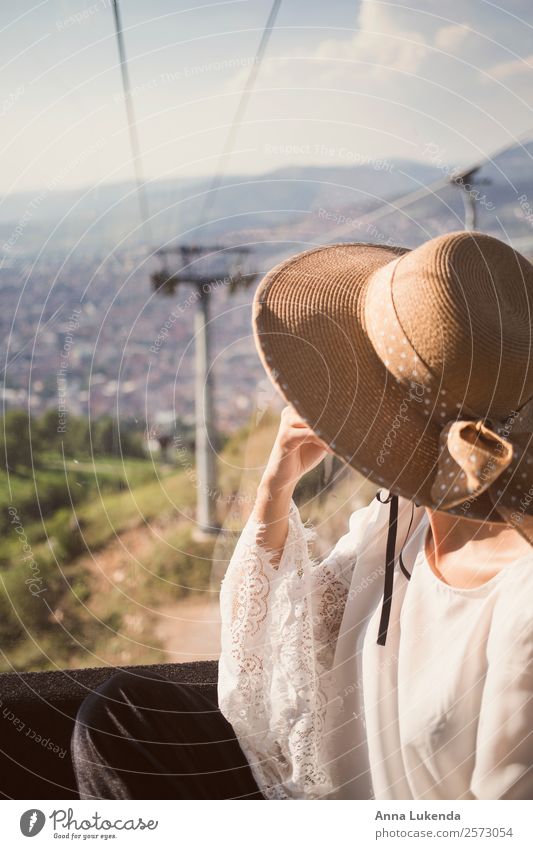 Girl with hat in the cable car. Human being Feminine Young woman Youth (Young adults) 1 18 - 30 years Adults Environment Nature Landscape Earth Sun Summer