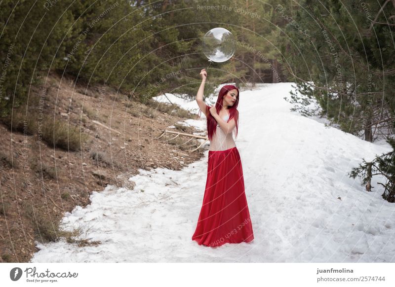 Redhead girl in the snow with a sphere Beautiful Body Human being Feminine Woman Adults 18 - 30 years Youth (Young adults) Landscape Winter Ice Frost Snow Tree