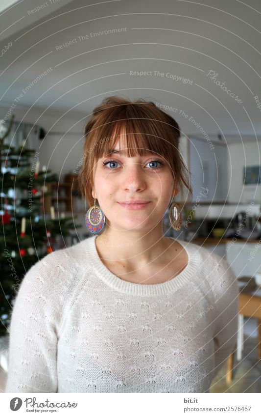 young woman stands in front of decorated fir tree Living or residing Flat (apartment) Christmas & Advent Human being Feminine Young woman Youth (Young adults)