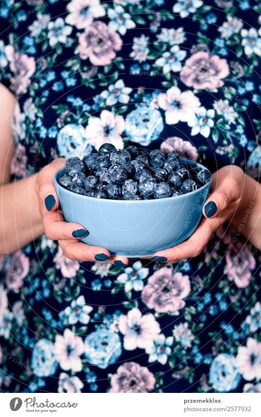 Female hands holding bowl filled with fresh blueberries Fruit Nutrition Eating Vegetarian diet Diet Bowl Lifestyle Summer Human being Woman Adults Body Hand 1