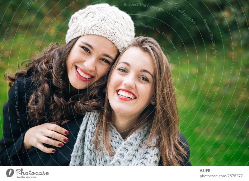 Best friends portrait Lifestyle Joy Happy Beautiful Winter Woman Adults Friendship Youth (Young adults) Autumn Park Fashion Scarf Smiling Laughter Love Embrace