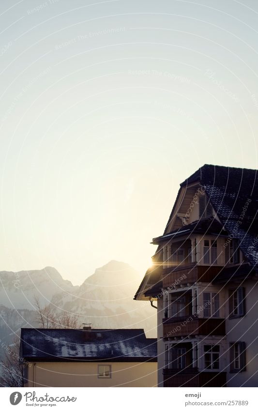 winter sun Sky Cloudless sky Winter Beautiful weather Mountain Village House (Residential Structure) Cold Winter sun Colour photo Exterior shot Deserted