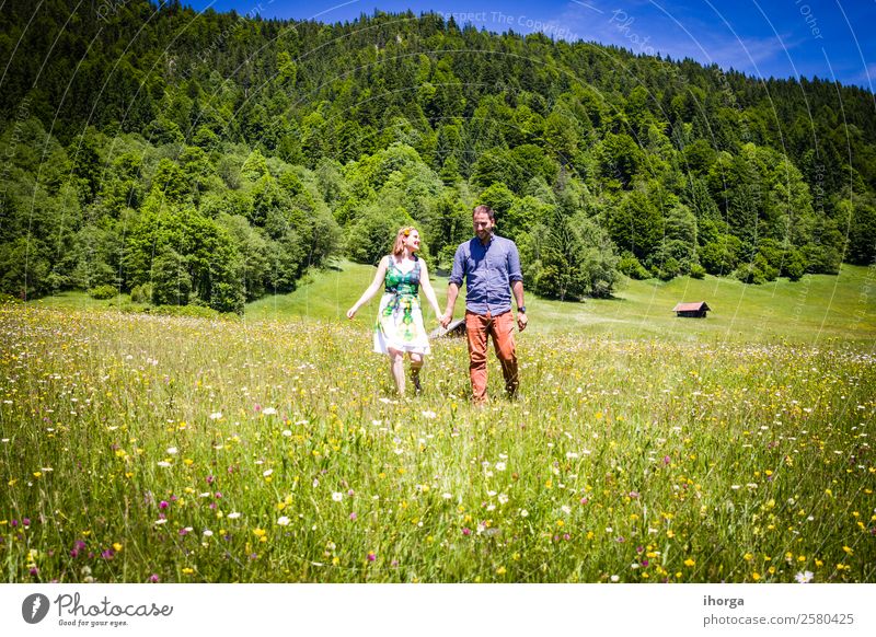 happy lovers on Holiday in the alps mountains Lifestyle Beautiful Relaxation Vacation & Travel Adventure Summer Mountain Woman Adults Man Couple 2 Human being