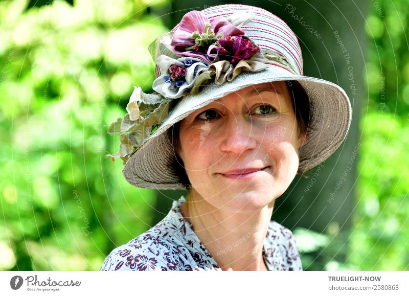 Woman with a romantic hat in beautiful weather in nature Lifestyle Elegant Style Joy Beautiful Leisure and hobbies Adults Head Face Eyes Nose Mouth 1