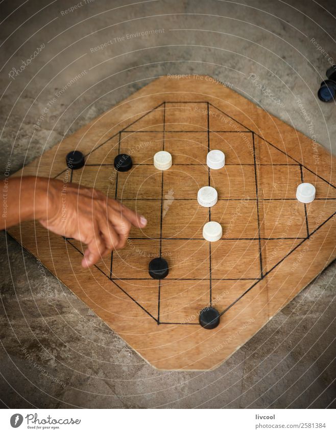 game of checkers-philippines Relaxation Playing Board game Island Table Entertainment Hand Culture Places Wood Education Asia Philippines Pacific Ocean