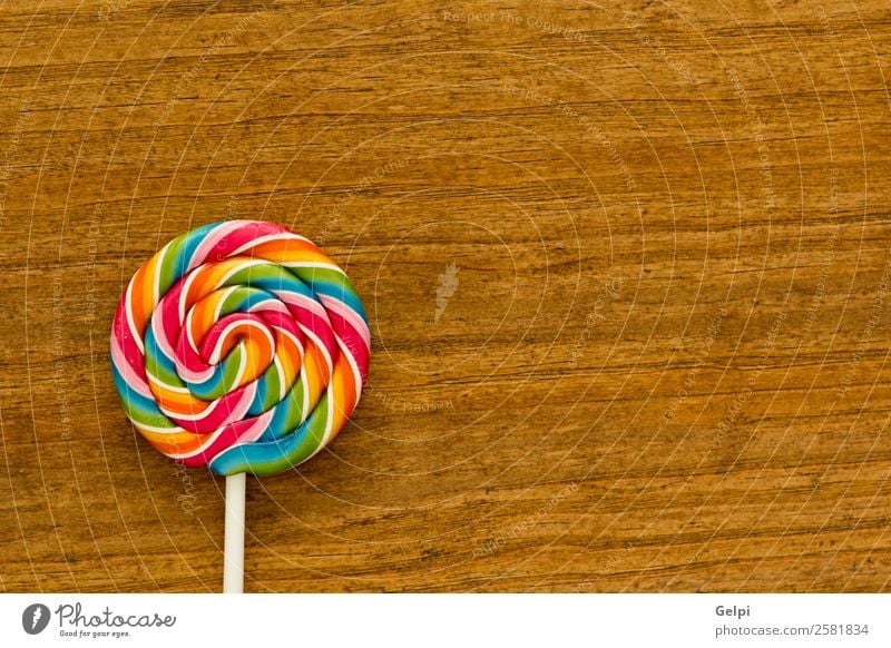 Nice lollipop Dessert Eating Joy Infancy Wood Delicious Retro Red White Colour candy food Lollipop sweet lolly Sugar colorful stick background Unhealthy Tasty