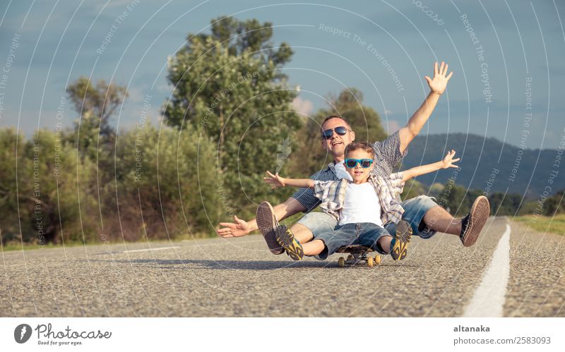 Father and son playing on the road Lifestyle Joy Happy Leisure and hobbies Playing Vacation & Travel Trip Adventure Freedom Camping Summer Mountain Sports Child