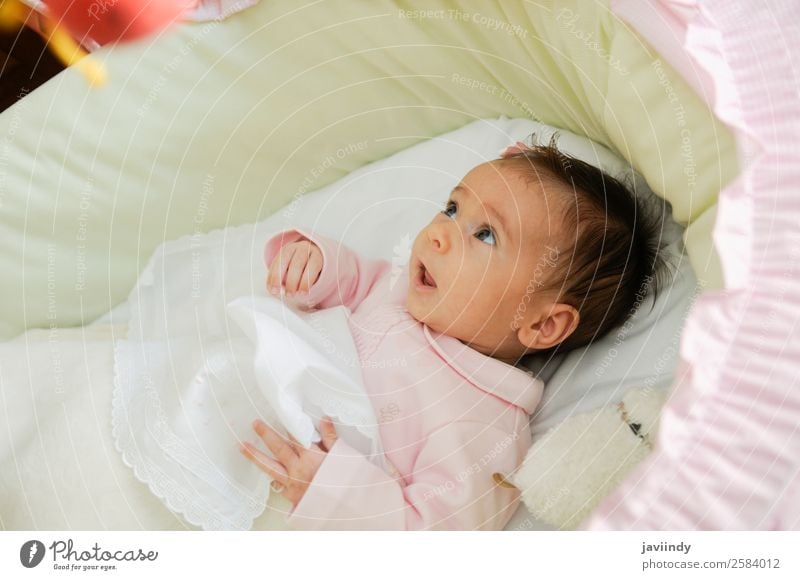 Baby girl two months old looking at a doll in his crib Joy Happy Beautiful Face Life Child Camera Human being Girl Infancy 1 0 - 12 months Smiling Laughter