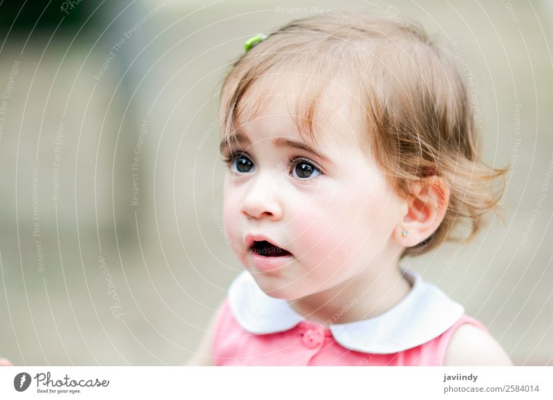 Little girl playing in a urban park Lifestyle Joy Happy Beautiful Leisure and hobbies Playing Summer Child Human being Baby Toddler Girl Infancy Head 1