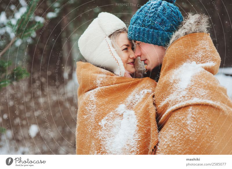 happy young loving couple walking in snowy winter Joy Vacation & Travel Adventure Freedom Winter Snow Woman Adults Man Couple Nature Snowfall Park Forest