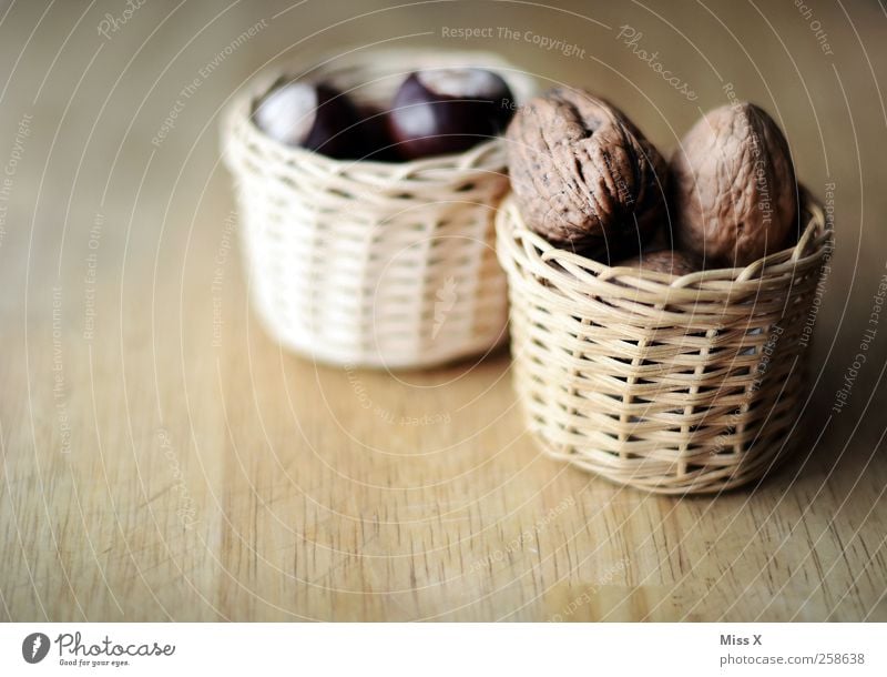 small basket Food Nutrition Bowl Delicious Brown Walnut Basket Chestnut Tree fruit Wood Wooden board Colour photo Subdued colour Close-up Deserted