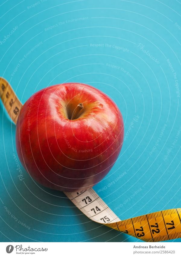 Red apple with a tape measure Fruit Apple Organic produce Vegetarian diet Diet Fasting Lifestyle Healthy Eating Overweight Well-being Christmas & Advent