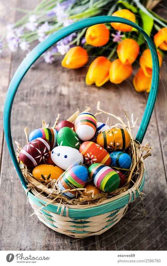 Easter eggs in a basket and tulips on wood Egg Colour Vacation & Travel Feasts & Celebrations Public Holiday Background picture Guest Decoration Festive Spring
