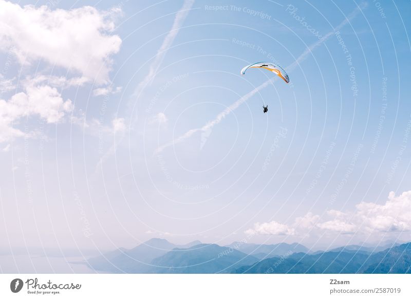 Paragliding | Lake Garda Leisure and hobbies Vacation & Travel Adventure Mountain Sports Parachute Human being 1 Nature Landscape Sky Clouds Summer