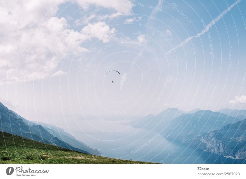 Paragliding | Monte Baldo | Lake Garda Leisure and hobbies Vacation & Travel Trip Adventure Summer vacation Mountain Human being Nature Landscape Sky Clouds